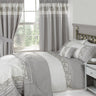 Elegant Chantilly Duvet Set featuring intricate lace detailing on duvet covers and matching pillowcases with button closures for a sophisticated bedroom decor