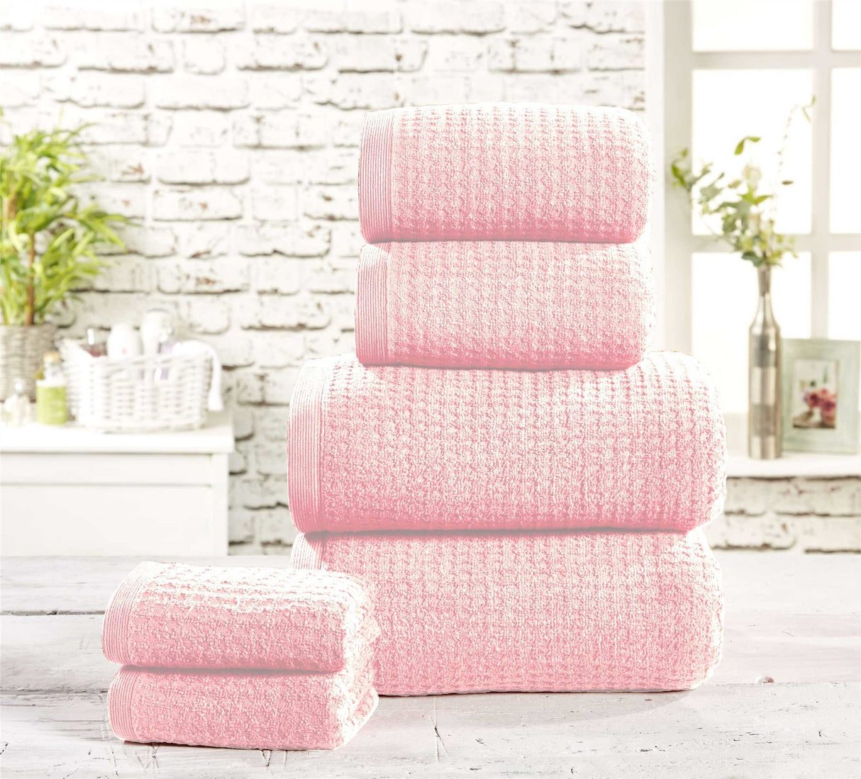 A soft and absorbent waffle-textured towel made from 100% cotton