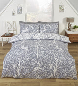 Leaping stags among trees and shrubbery on the Tatton Duvet Set 