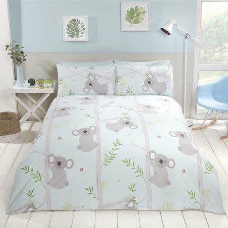 A colourful duvet set featuring playful koalas climbing among green and blue branches, with matching pillowcases and easycare fabric