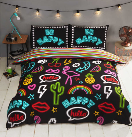 Bright colourful reversible duvet cover featuring trendy cactus, flamingo, and pineapple motifs with a neon print design and matching stripe reverse