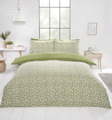 Blue Pebbles Duvet Set made from microfibre fabric with all-over geometric pattern and plain reverse