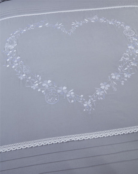 Superking bed set with embroidered hearts, crochet lace trimming, and detailed design elements