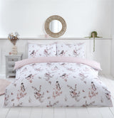 A pink Vintage Toile Duvet Set featuring a charming bird and floral print with easycare, non-iron microfibre fabric
