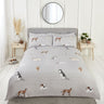 Stylish duvet set featuring hand-drawn dogs on textured ground with reversible striped reverse