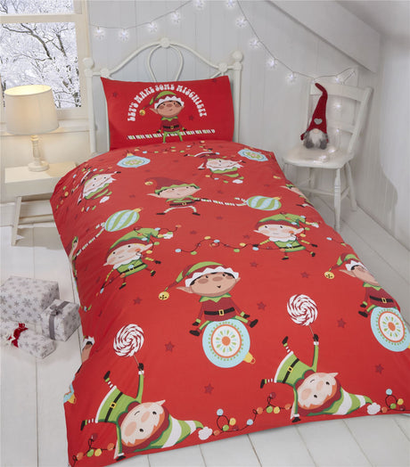 Cheeky elves swinging from fairy lights on festive red duvet cover set with candy canes