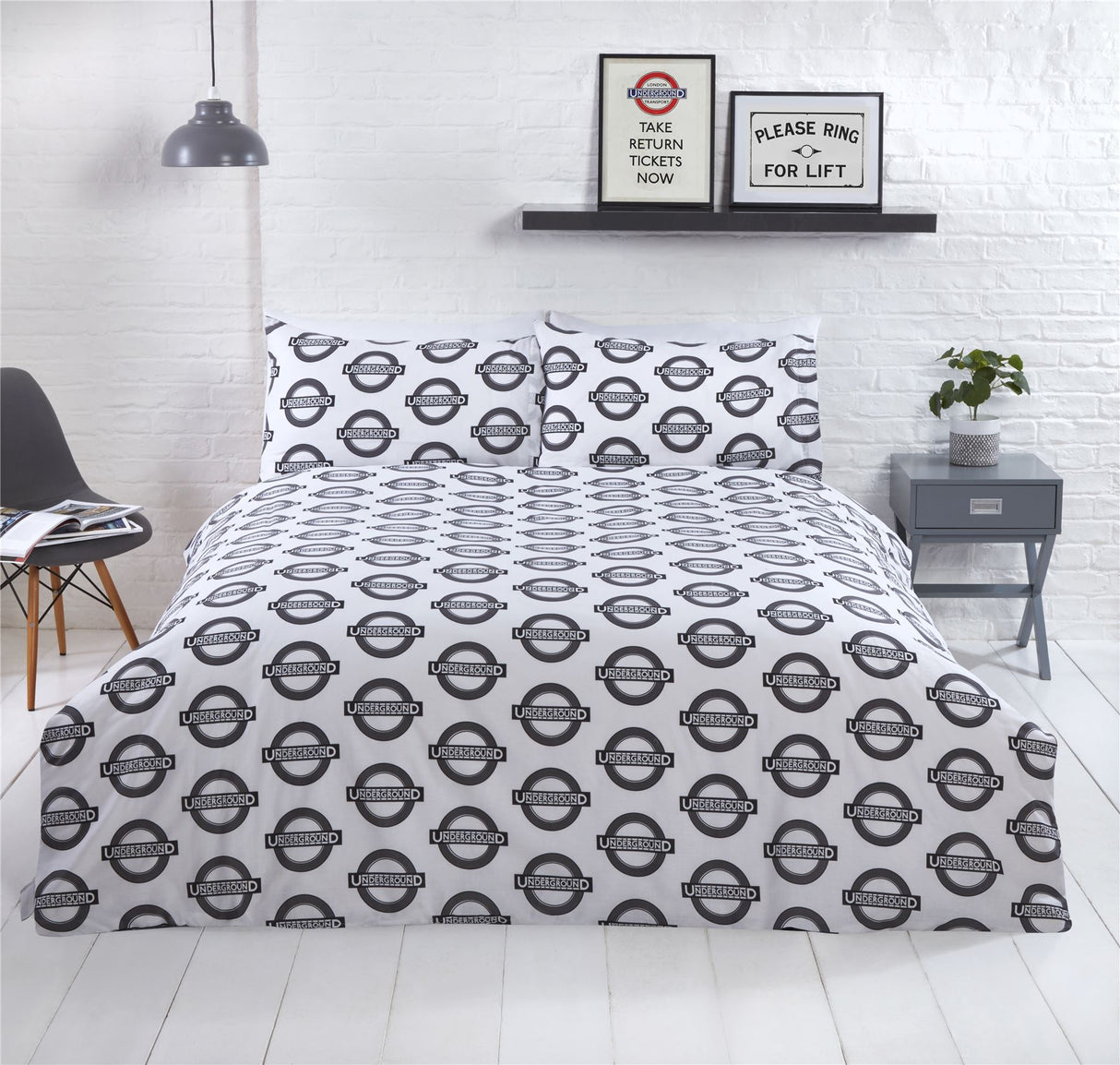 Official TfL licensed product showcasing historic London Underground imagery and stylish popper closure
