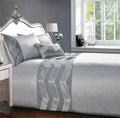 Elegant Valencia Boudoir cushion showcasing sophisticated chevron pleating in matte satin on a poly cotton backing, ideal for enhancing a boudoir bedroom setting