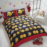 A colourful, reversible Christmas Icons duvet set featuring cheerful emoticons on bold black and white backgrounds, including matching pillowcases, with popper closures and easy-care fabric