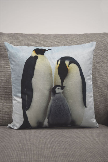 Velvet filled cushion with a photographic print of a family of penguins, 43x43cm