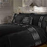 Luxurious crystal-filled cushion adorned with sparkling diamantes and elegant pintucks